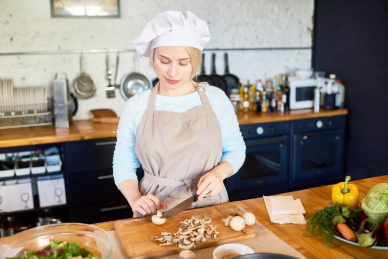 young-female-cook-working-in-kitchen.jpg